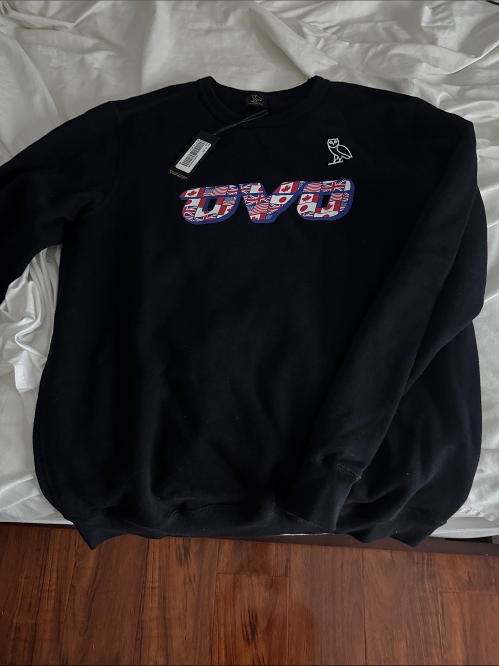 OVO Black Crewneck with Multicolor Flag Logo